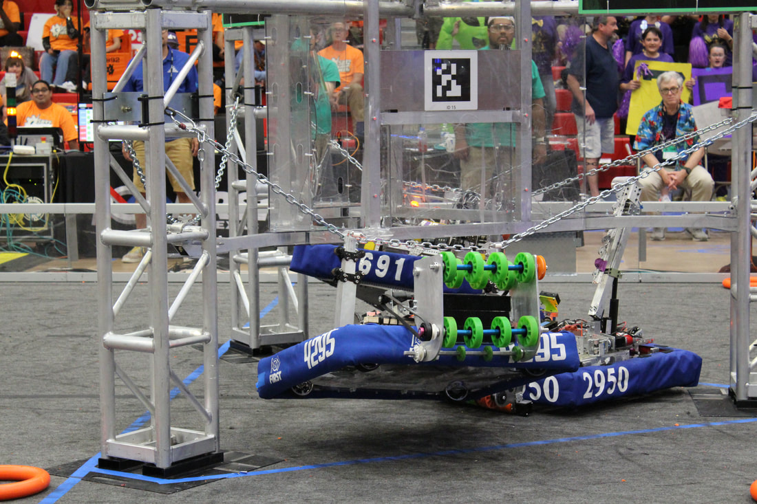 Hudson Stingers FRC robot climbing during competition