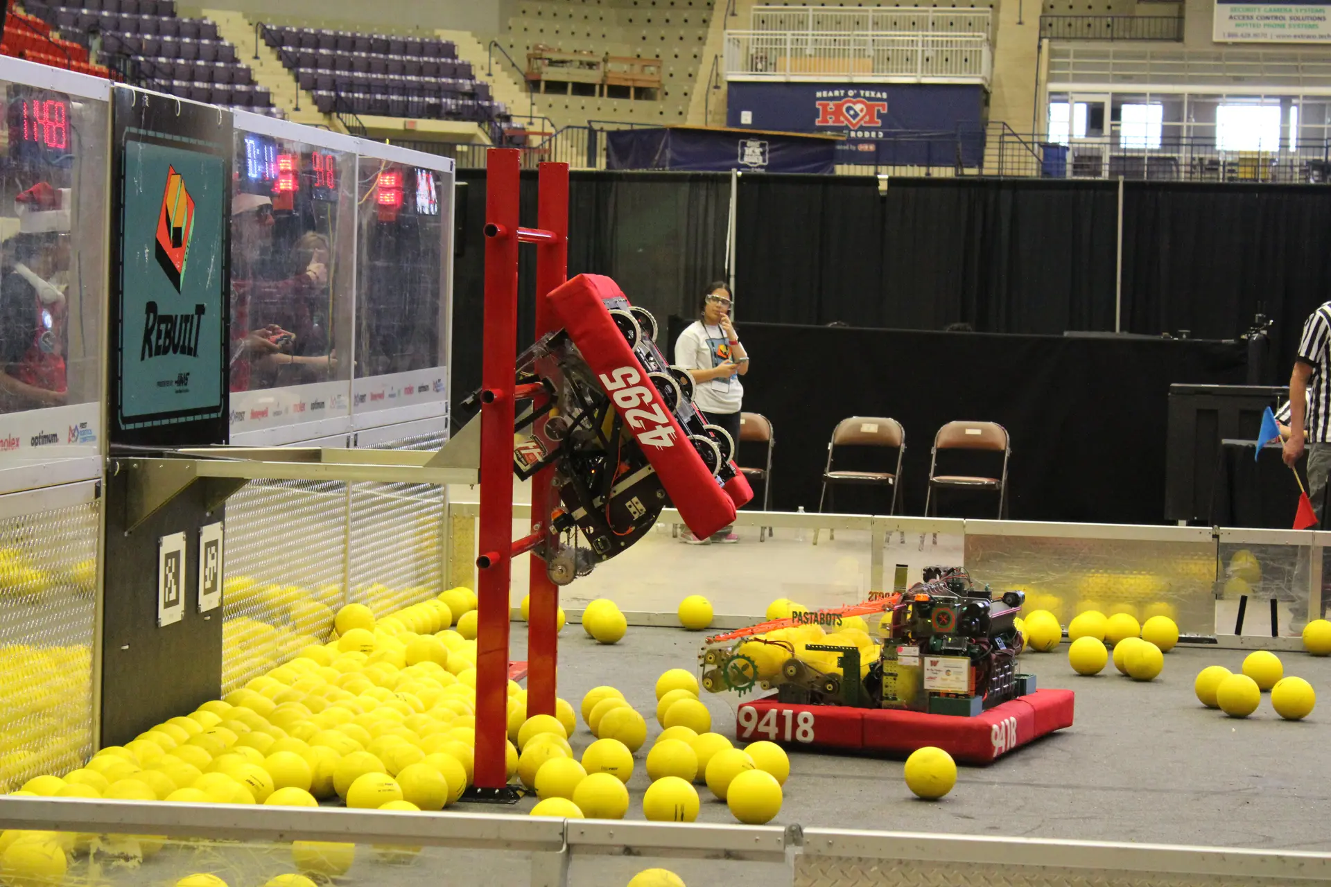 FRC Team 4295 Hudson Stingers robot performing Tier 2 climb in Red Alliance